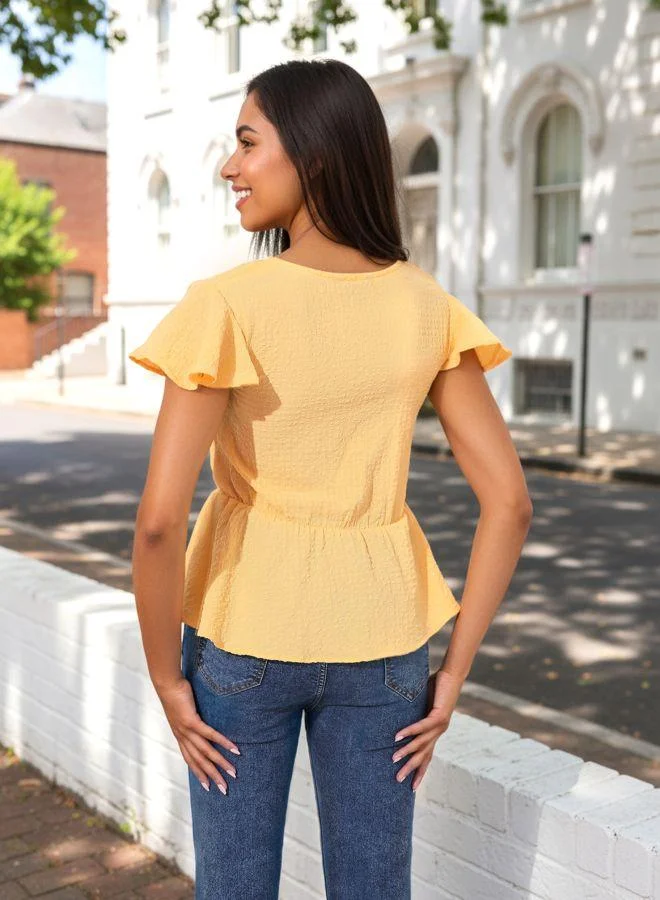 Freehand  Women Fit and Flared Textured V neck Half Sleeves Peplum Top for Women | Best Price UAE